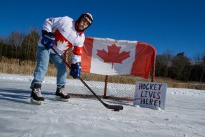Hockey net with Canada flag draped