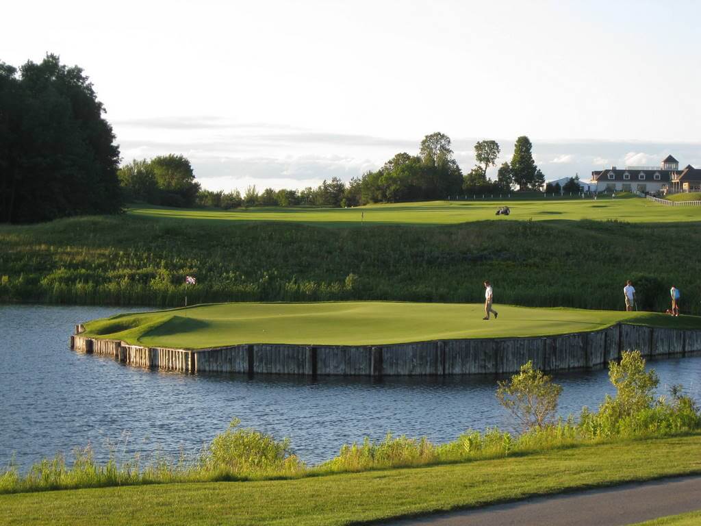 Wooden Sticks golf course hole surrounded by water